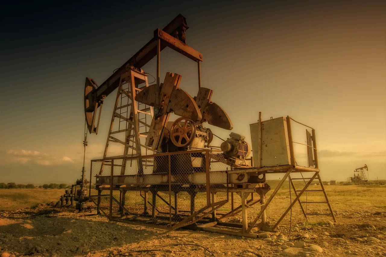 Oil rig at sunset