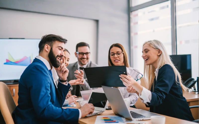 professionals in suits during a company meeting