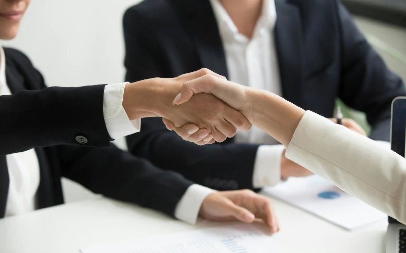 professionals shaking hands.webp